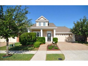 Attractive curb appeal and glass door greets you upon arrival.