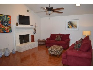 Large family room with high ceilings and a lot of natural light.